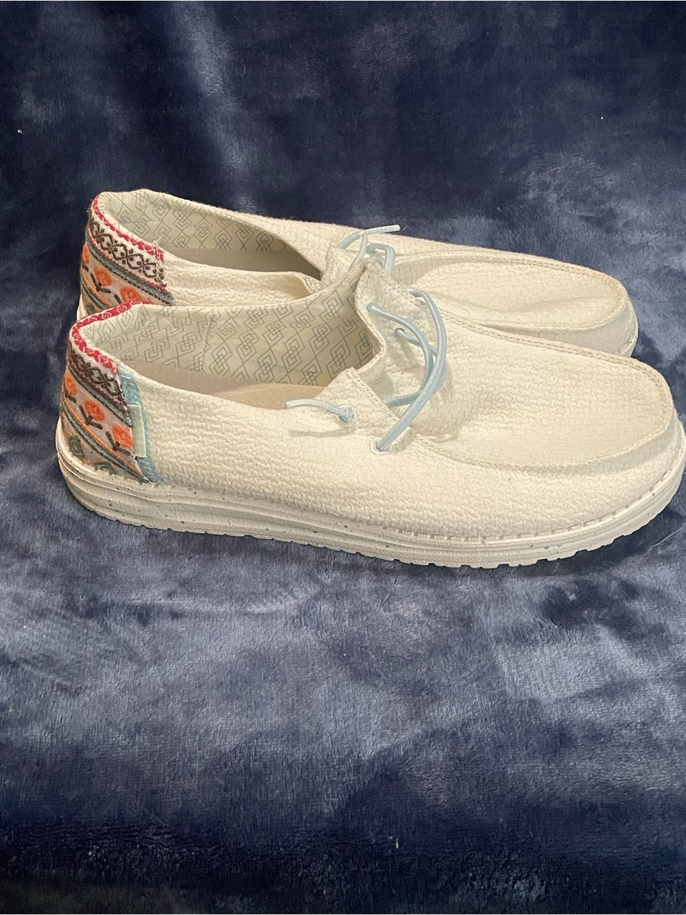 Hey Dude Women's White Slip-On Sneakers with Multicolor Heel Accent
